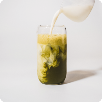milk being poured into everyday dose matcha