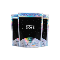 VIP Annual Plan Everyday Dose Mushroom Coffee bags with holographic packaging on black starry background
