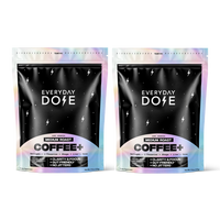 Two black pouches of medium roast coffee with holographic edges and white lightning bolt designs