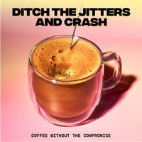 Clear glass mug filled with frothy coffee and a spoon stirring against a soft pink and yellow gradient background with bold text above and below