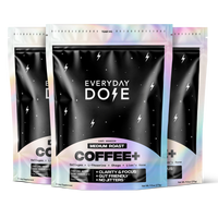 Black and iridescent coffee bags labeled medium roast coffee plus with lightning bolt design and key benefits listed below