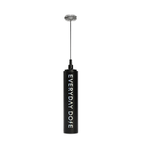 Black cylindrical device with a textured round top and vertical EVERY DAY DOPE lettering