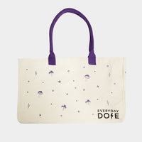 Events Tote Bag featuring cream canvas with purple handles and playful mushroom pattern with lightning bolt accents
