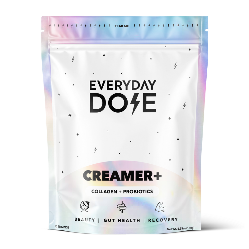 Resealable pouch with a pastel iridescent border, labeled Everyday Dose Creamer+ for collagen, probiotics, and wellness benefits