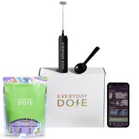 Everyday Dose matcha pouch with frother, scoop, white box, and smartphone displaying app on transparent background