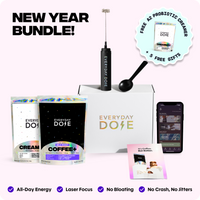 Coffee whisk, black scoop, two holographic coffee and creamer pouches, and smartphone app with Everyday Dose branding on white box