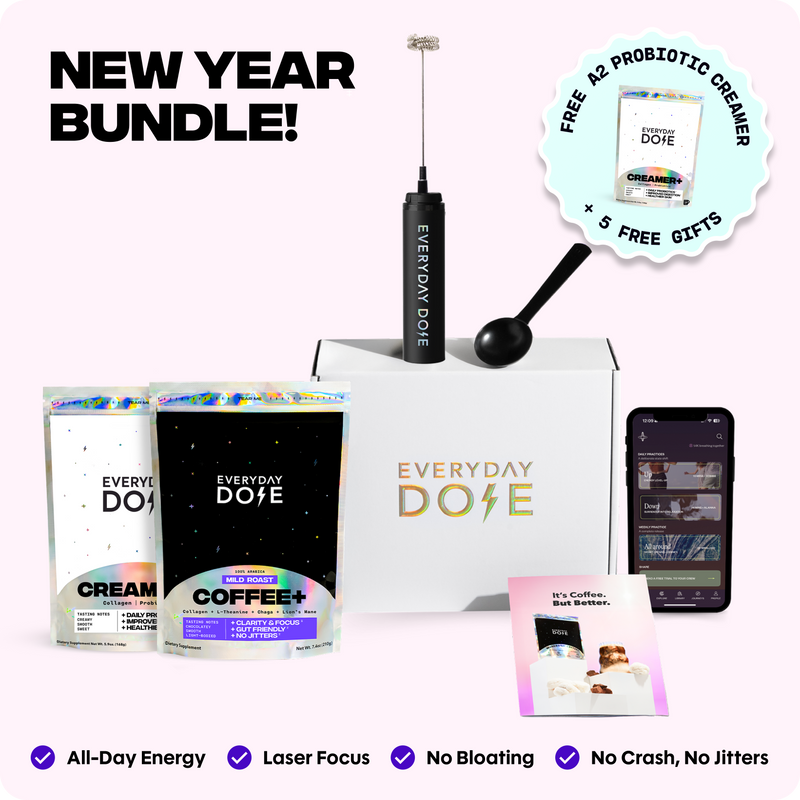 Coffee whisk, black scoop, two holographic coffee and creamer pouches, and smartphone app with Everyday Dose branding on white box
