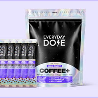 Front view of 30 serving Coffee+ pouch showcasing the Everyday Dose logo with five free stick packs displayed to the left on a light purple background